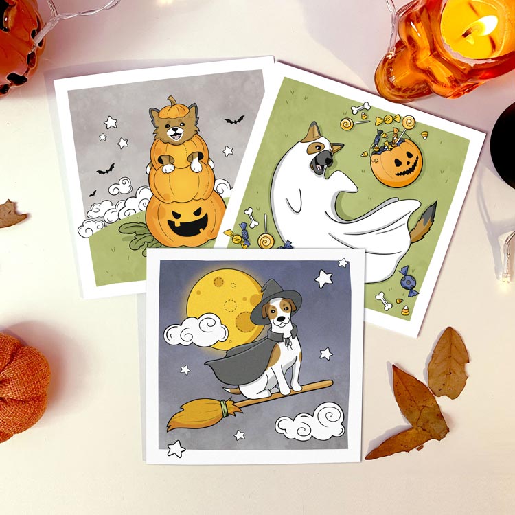Pack of greeting cards featuring dogs in Halloween costumes.