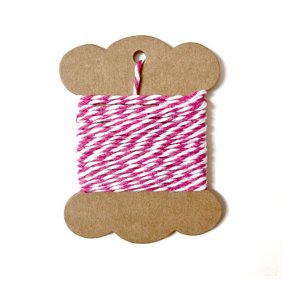 Pink and white striped twine for baking and crafts.