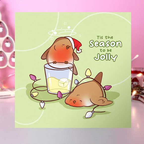 Festive greeting card with 'Tis The Season To Be Jolly'.