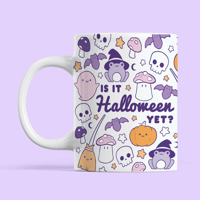 Halloween-themed mug with text "Is It Halloween Yet?" in spooky font.