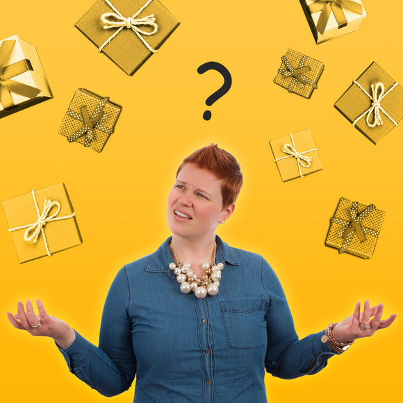 Confused looking lady with wrapping paper