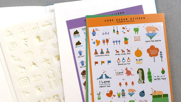 Sticker sheets on a Notebook