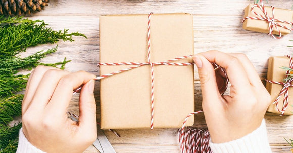 Wrapping a gift with twine