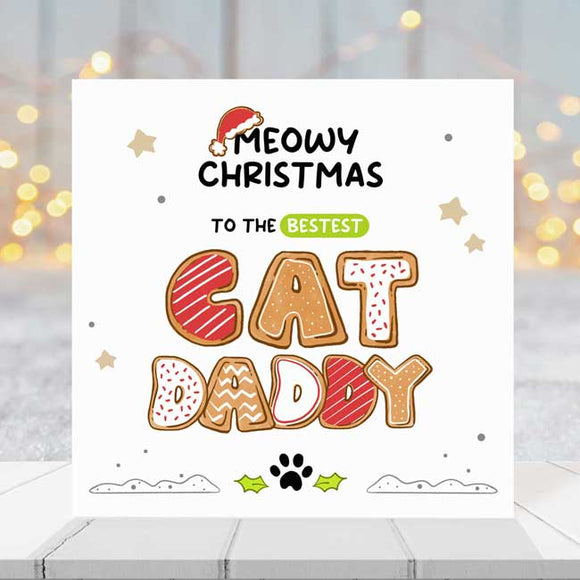 Christmas card featuring 'Best Cat Dad' title with festive design.