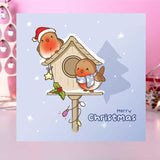 Illustrated Christmas card featuring a robin bird box in a snowy scene.