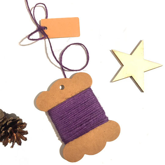 Roll of purple jute twine for crafting and gardening.