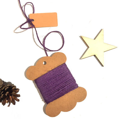 Roll of purple jute twine for crafting and gardening.