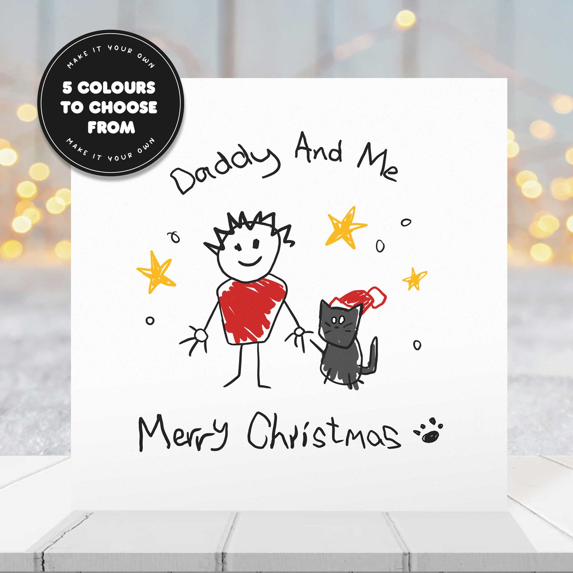 Christmas card with a child like drawing of a dad holding hands with a black cat, against a blurred winter background.