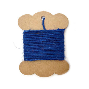 Roll of blue jute twine for crafting and wrapping.