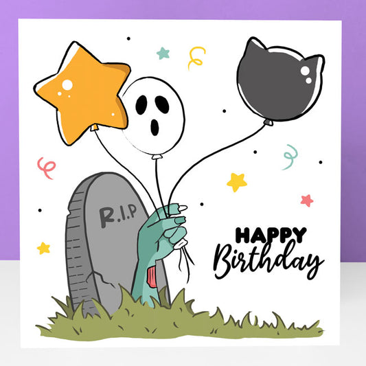 Halloween-themed birthday card with graveyard design.
