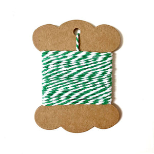 Green and white striped twine for baking and crafting.