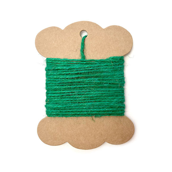 Roll of green jute twine for wrapping and crafting.