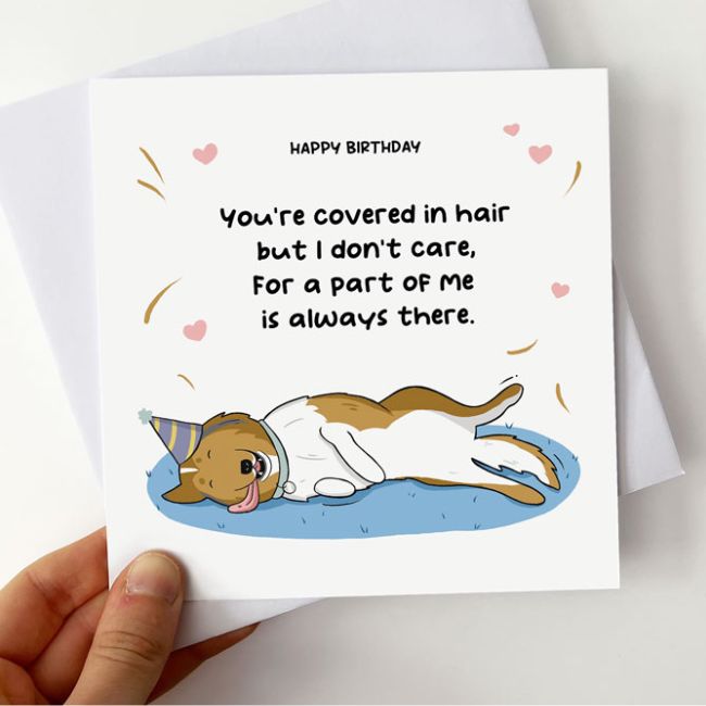 Holding birthday card from the Rough Collie