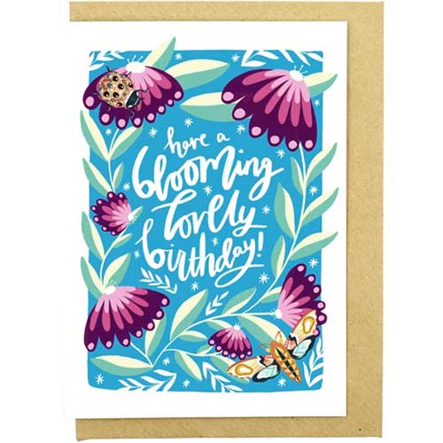 Floral-themed birthday card with vibrant, blooming flowers design.