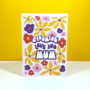 Greeting card with floral design and "Love you Mum" text.