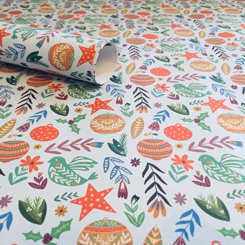 Colorful wrapping paper with bird and flower designs, eco-friendly.