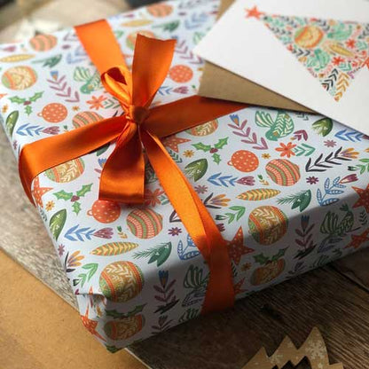 Festive greeting card shaped like a stocking with "Christmas Wishes" text.