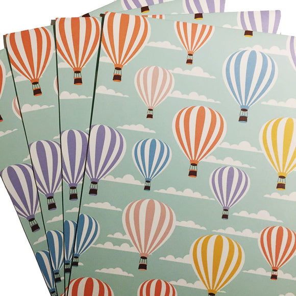 Eco-friendly wrapping paper with hot air balloon print design.
