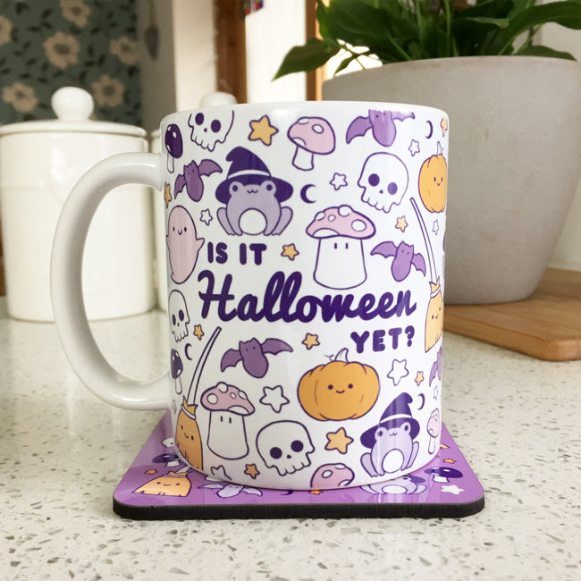 Halloween-themed mug with text "Is It Halloween Yet?" in spooky font.