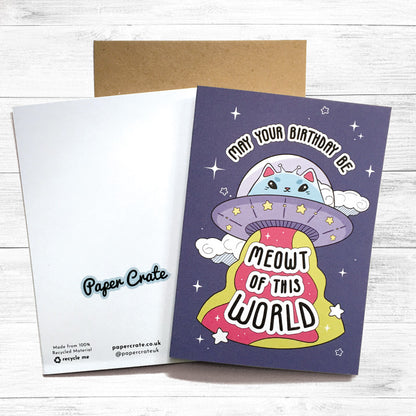 Whimsical space-themed birthday card with a cat in an astronaut suit.