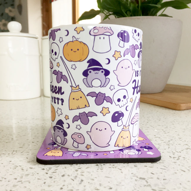 Halloween-themed mug with text "Is It Halloween Yet?" in spooky font.