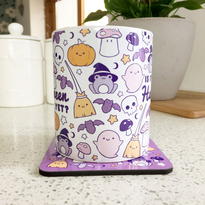 Halloween-themed mug with text "Is It Halloween Yet?" in spooky font.