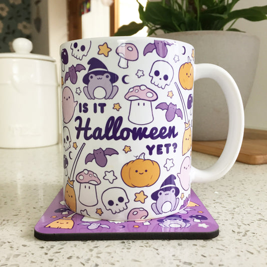 Halloween-themed mug with 'Is It Halloween Yet?' text.