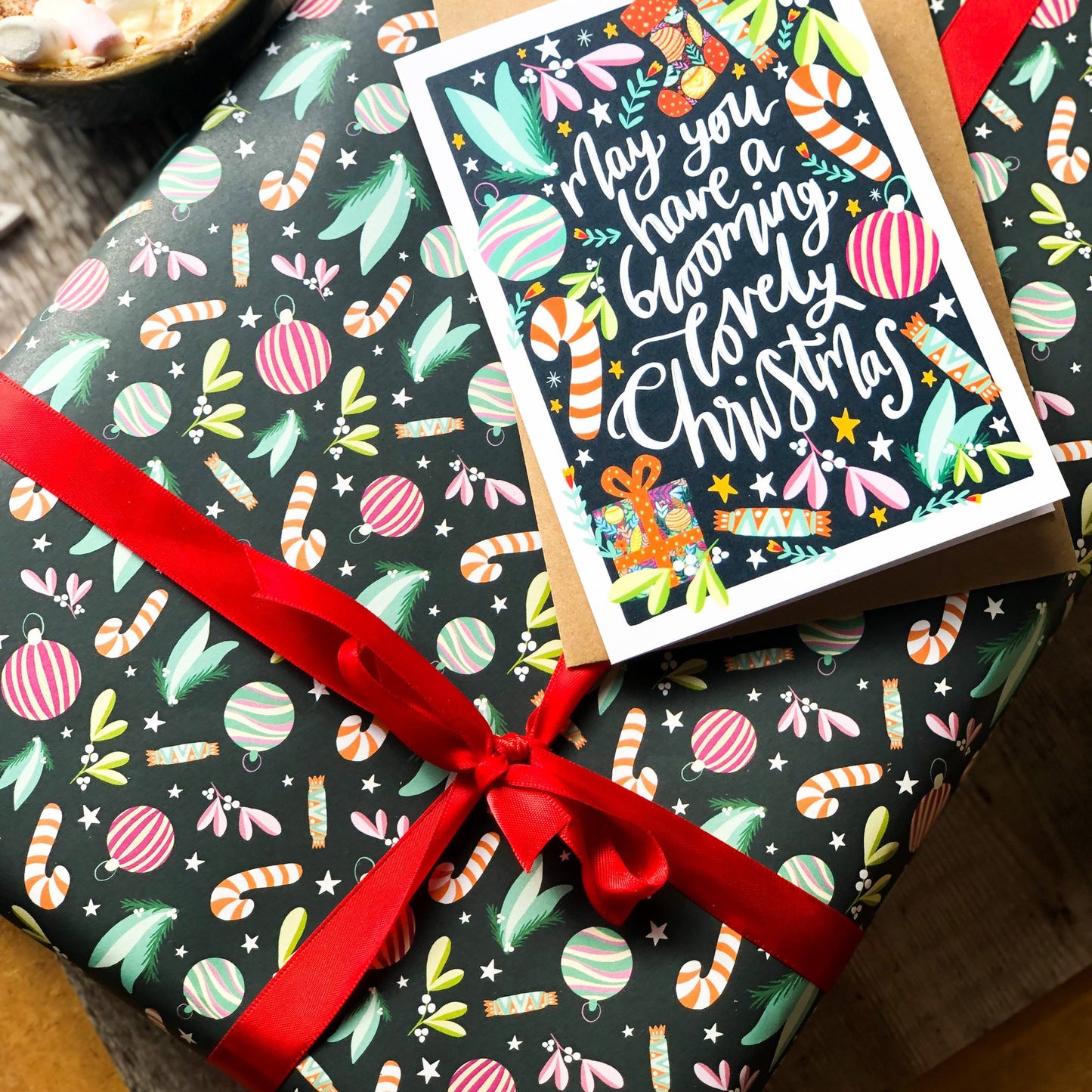 Colorful wrapping paper with candy cane design, eco-friendly material.