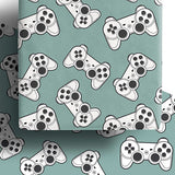 Eco-friendly wrapping paper with game controller pattern for gifts.