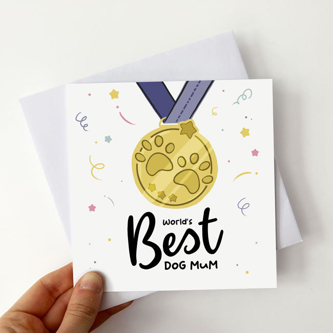 Card featuring medal design with "World's Best Dog Mum" inscription.