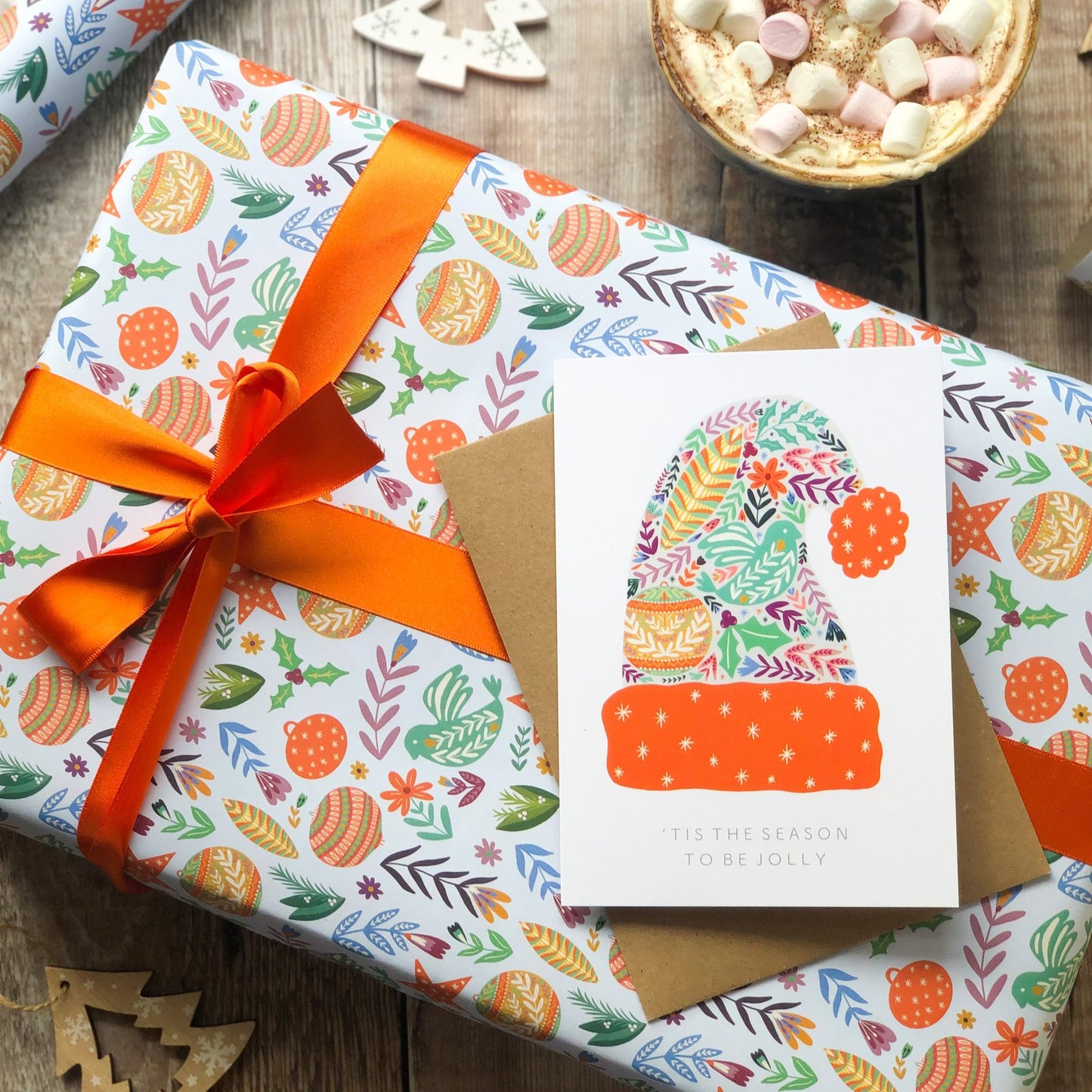 Colorful wrapping paper with bird and flower designs, eco-friendly and recyclable.