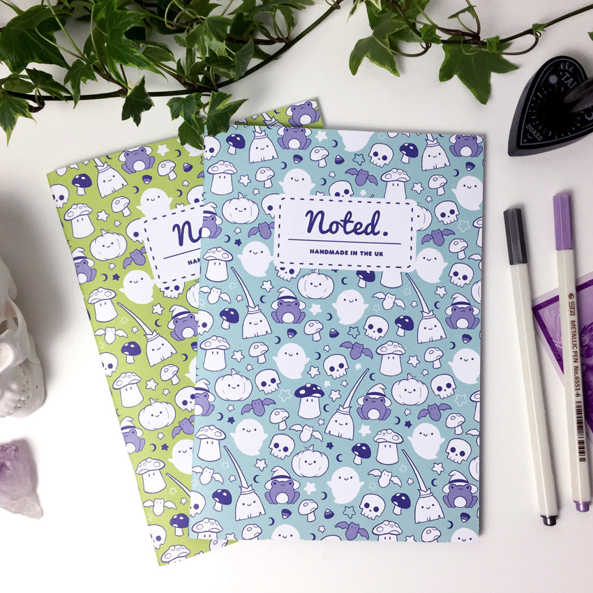 Halloween-themed notebook with spooky yet adorable patterns on cover.