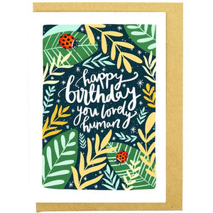 Greeting card with "Happy Birthday Lovely Human" message.