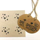 Eco-friendly wrapping paper with pixelated heart design, includes tags and string.
