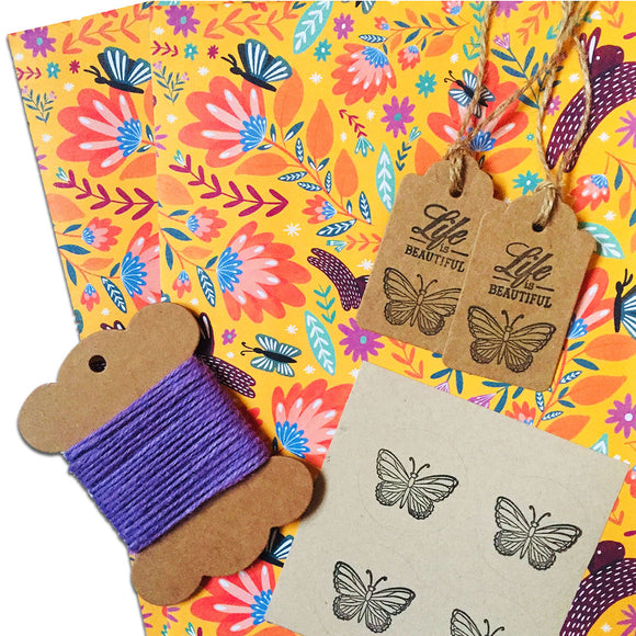 Eco-friendly wrapping paper with folk art bunnies and butterflies.